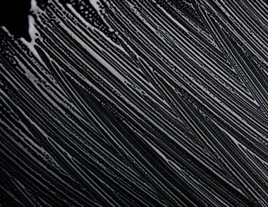 Beyaz sabun doku nadir beyaz köpük üzerinde siyah arka plan el yapımı hipster köpük doku soyut