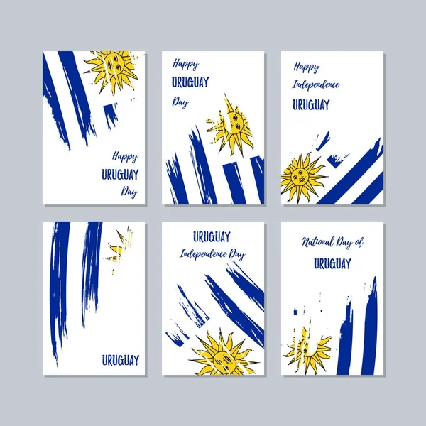 Uruguay patriotiska kort för nationella dag uttrycksfulla penseldrag i nationella flagga färger på vit — Stock vektor