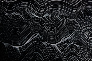 Beyaz sabun doku ince beyaz köpük üzerinde siyah arka plan el yapımı hipster köpük doku soyut