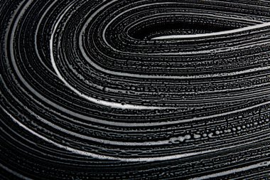 Beyaz sabun doku çok güzel beyaz köpük üzerinde siyah arka plan el yapımı hipster köpük doku soyut