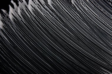 Beyaz sabun doku siyah arka planda el yapımı hipster köpük doku soyut büyük beyaz köpük