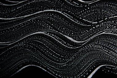 Beyaz sabun doku düzgün beyaz köpük üzerinde siyah arka plan el yapımı hipster köpük doku soyut