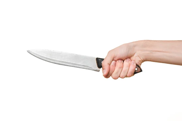 Чоловіча рука тримає великий ніж у погрозливій позиції на широкому білому тлі . Ліцензійні Стокові Фото