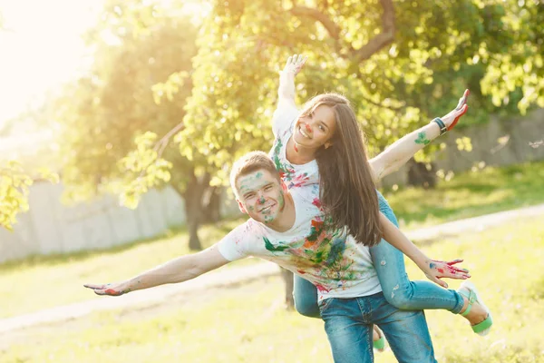 Pretty young couple making a plane or aircraft. Beautiful girl a — Stock Photo, Image