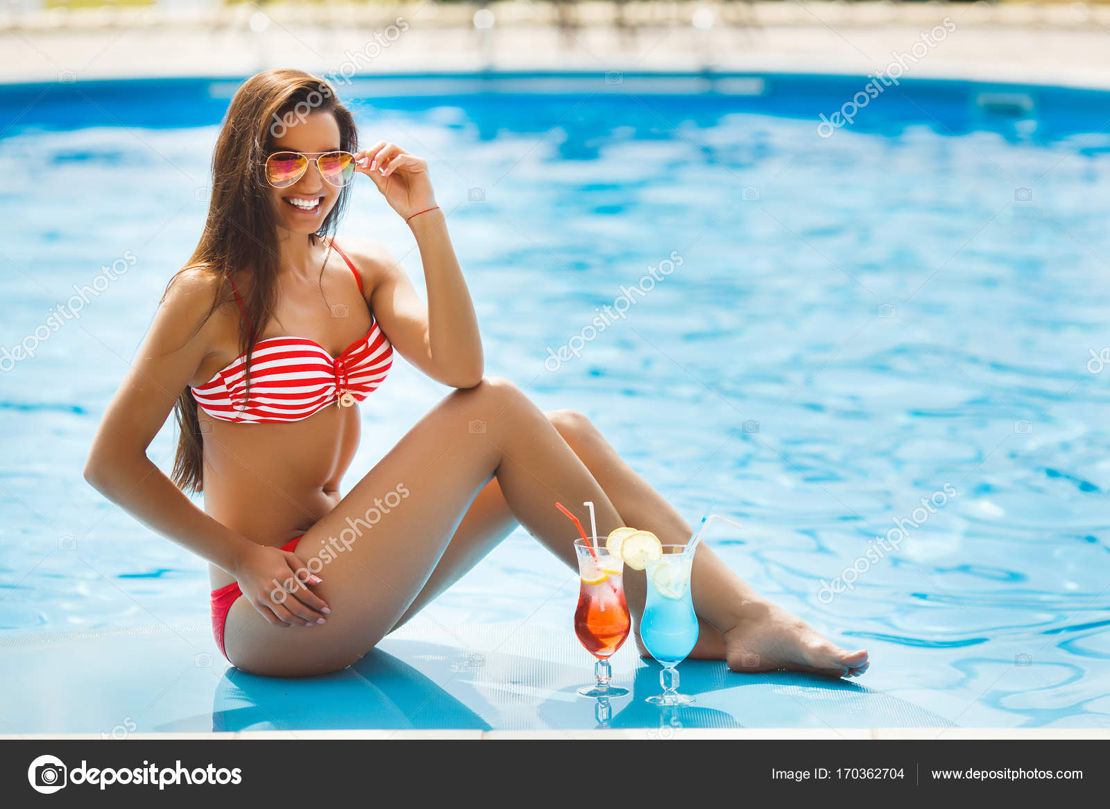 Pretty Woman Near The Swimming Pool Stock Photo By Elenachhil 170362704