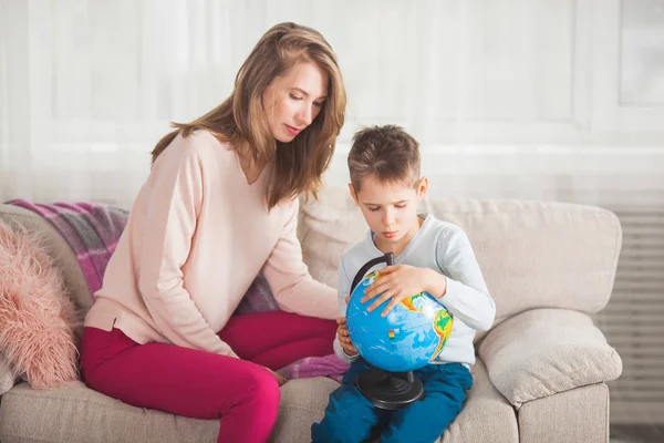 Mother Son Playing Home Globe Choosing Travel — Stock Photo, Image