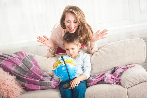 Mother Son Playing Home Globe Choosing Travel — Stock Photo, Image