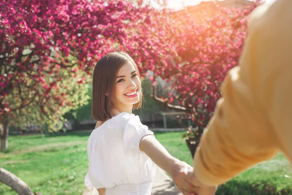 Woman Holding Her Boyfriend Hand Young Couple Together Walking Garden — 스톡 사진