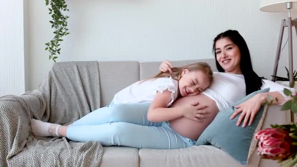 Young Pregnant Mother Her Little Daughter Indoors Child Her Mom — Stock Video