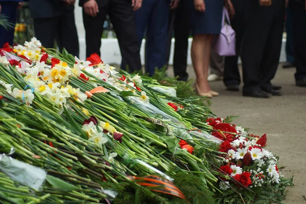 Eternal flame memory war victory fascism Germany USSR Russia May 9 monument to the fallen laying on veterans military medals winning war veterans