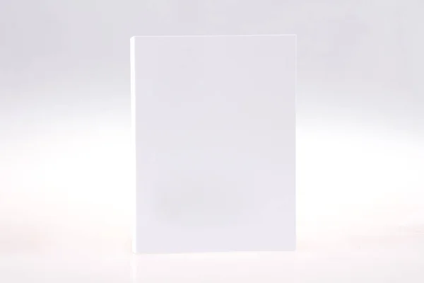 White blank paper box front view on light grey background. — Stock Photo, Image
