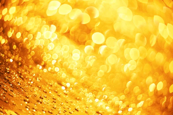 Luzes douradas desfocadas — Fotografia de Stock