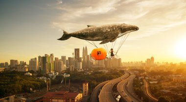 whale with pumpkin and two girls over cityscape 