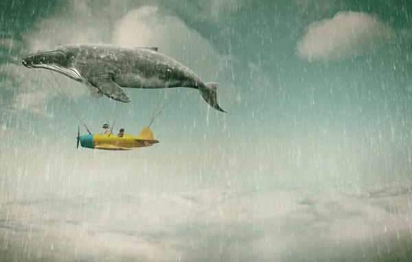 Whale with aircraft and two girls over clouds — Stock Photo, Image
