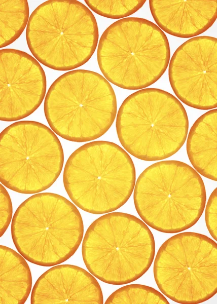 Много нарезанных оранжевых колец — стоковое фото