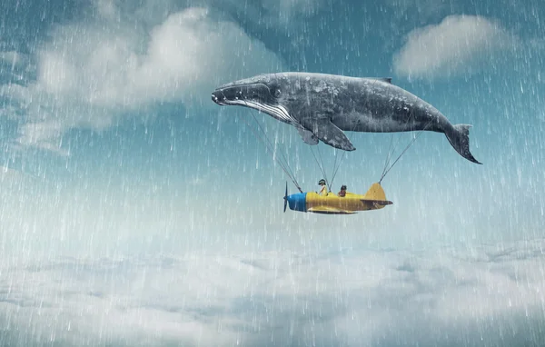 Baleia com aviões e duas meninas sobre nuvens — Fotografia de Stock