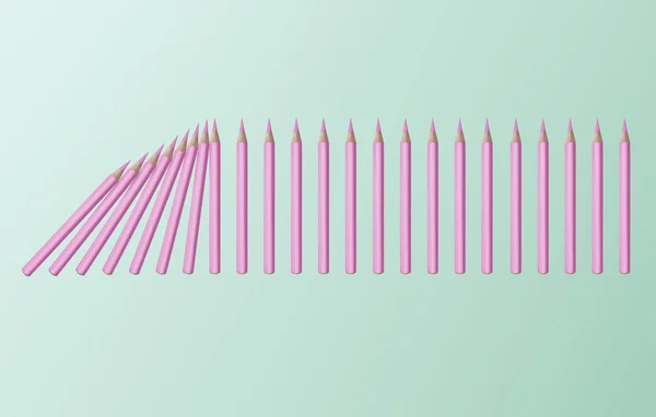 Effetto domino matite rosa — Foto Stock