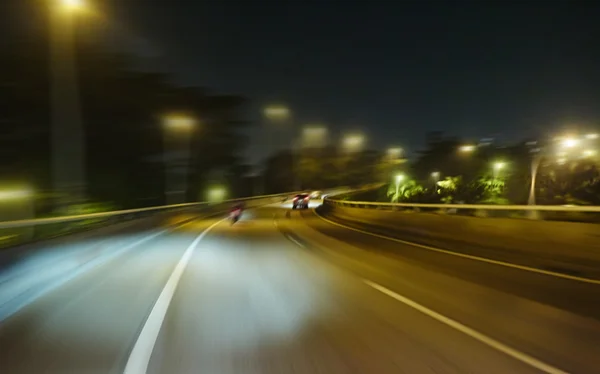 Estrada noturna cena movimento borrão — Fotografia de Stock