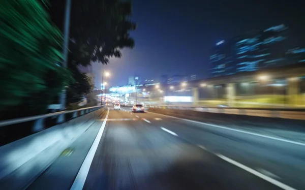 Estrada noturna cena movimento borrão — Fotografia de Stock