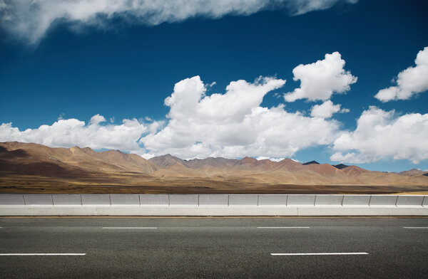 Empty asphalt road against nature landscape