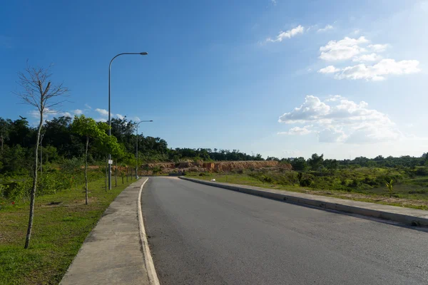 Route asphaltée dans le paysage — Photo