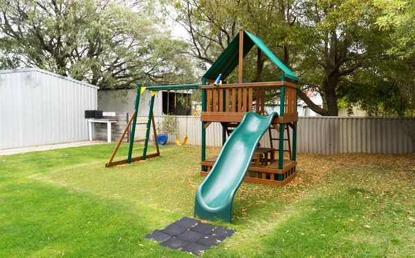 Playground in green backyard garden — Stock Photo, Image