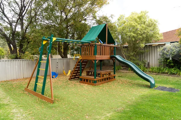 Playground in green backyard garden — Stock Photo, Image
