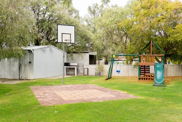 Playground in green backyard garden Stock Image