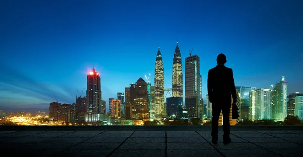 Businessman on roof top balcony — Stock Photo, Image