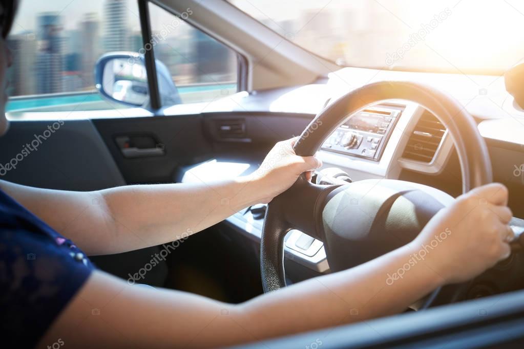 Woman driving car