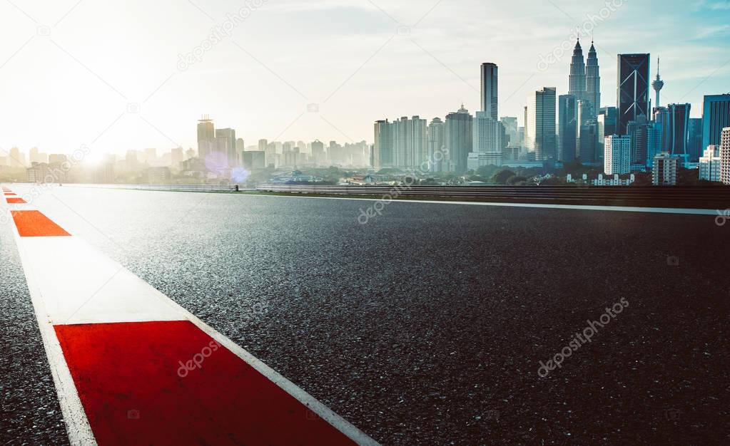 Racetrack with red and white safety sidelin