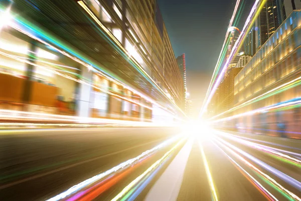 Ambiente cálido ciudad calle movimiento borroso fondo — Foto de Stock