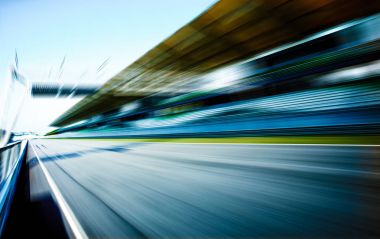 Racetrack in motion blur, racing sport background . clipart