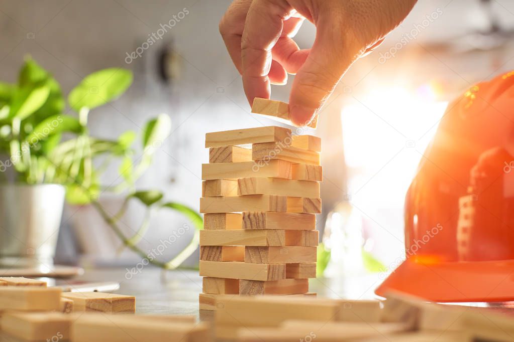 Hand with wood block