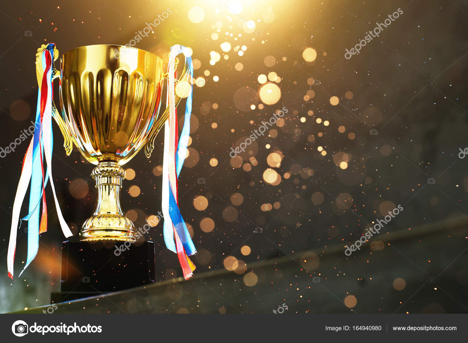 Low Key Golden Trophy Blur Gray Background Abstract Shiny Lights Stock  Photo by ©jamesteohart 164940980