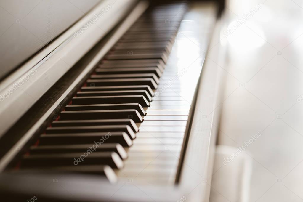 Close up view of black piano keys , selected focus .