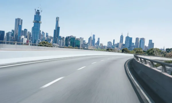 Highway overpass motion blur with Melbourne city — Stock Photo, Image