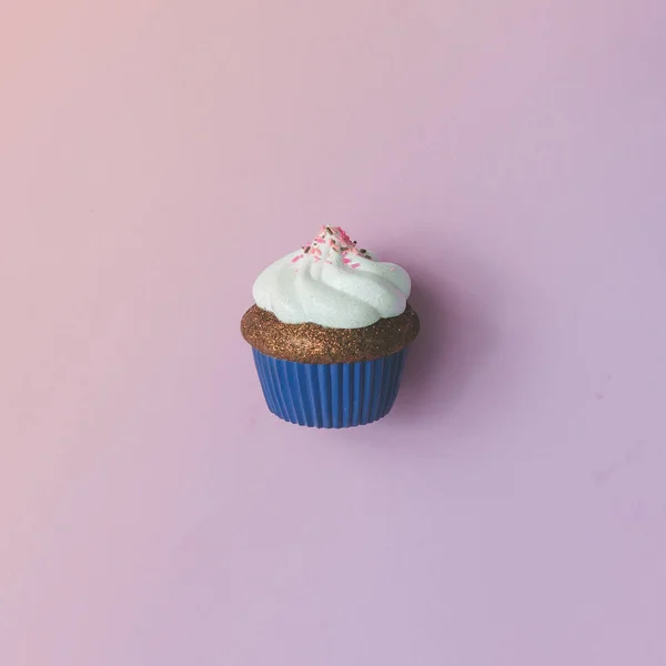 Cupcake with cream topping — Stock Photo, Image