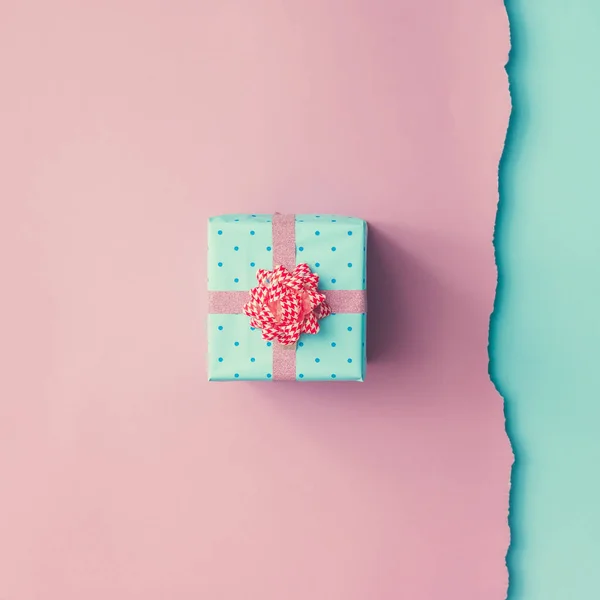 Small gift with pink ribbon — Stock Photo, Image