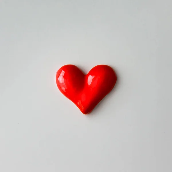 Red paint in shape of  heart — Stock Photo, Image