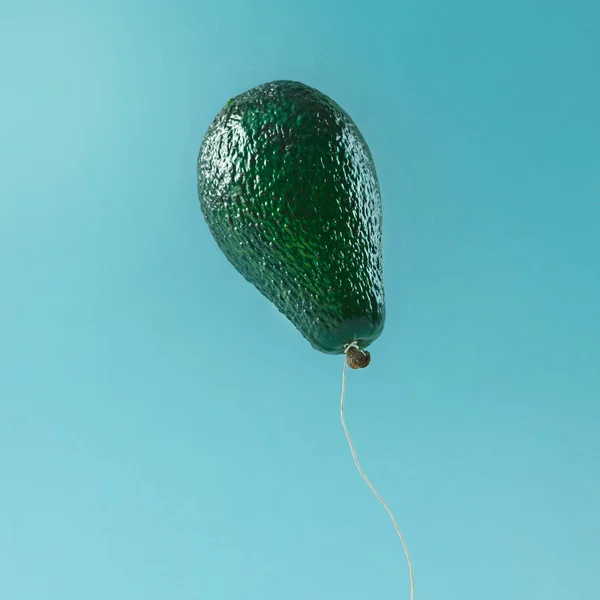 Balloon made of avocado fruit — Stock Photo, Image