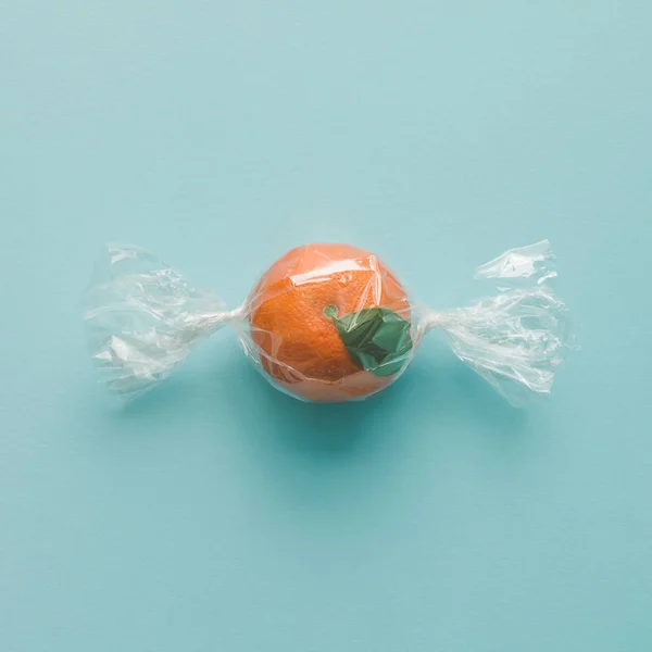 Orange wrapped like candy — Stock Photo, Image