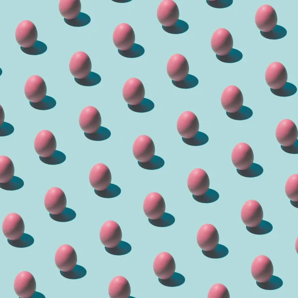 Padrão feito de ovos rosa — Fotografia de Stock