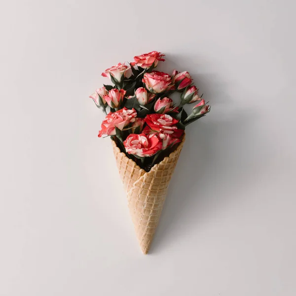 Ice cream cone with rose flowers — Stock Photo, Image