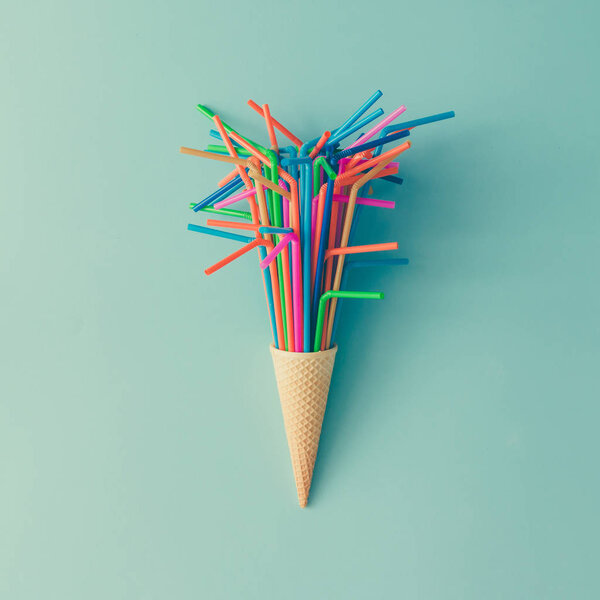 Ice cream cone with drinking straws 