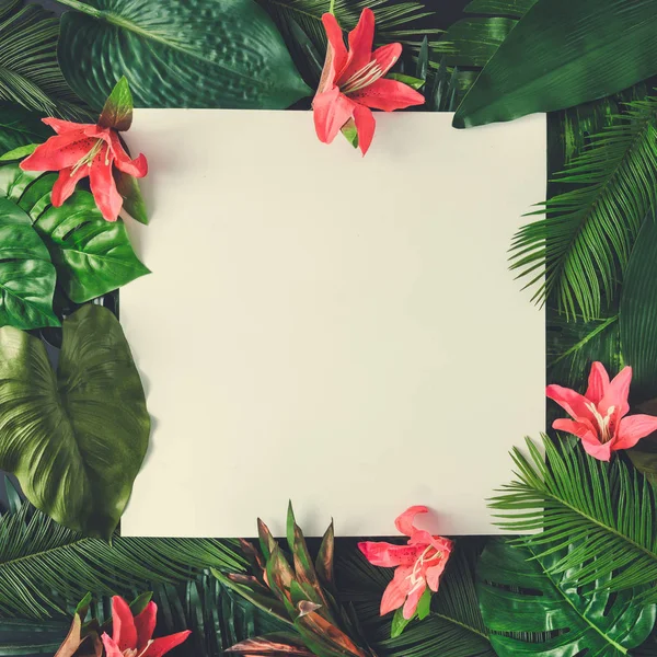 Creative layout made of tropical leaves — Stock Photo, Image