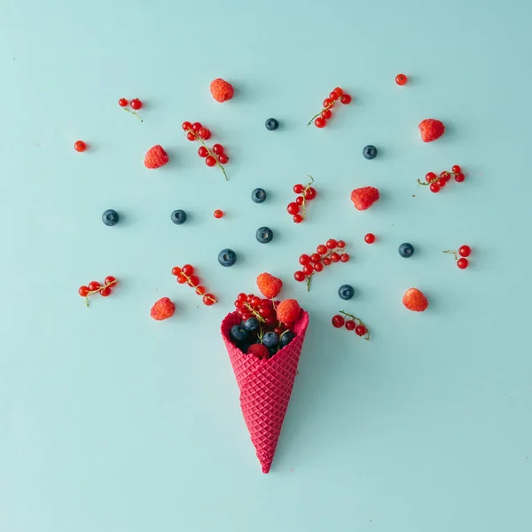 Forest berries with ice cream cone — Stock Photo, Image