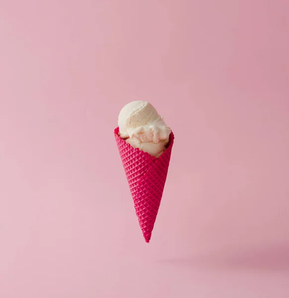 Vanilla ice cream in red cone — Stock Photo, Image