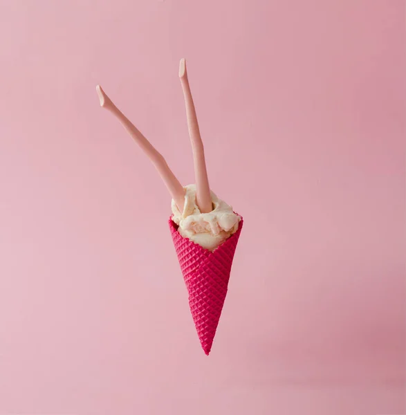Doll legs in ice cream cone — Stock Photo, Image