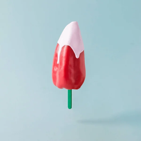 Red pepper with ice cream stick — Stock Photo, Image